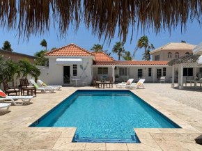Гостиница Tu Casita en Aruba  Палм-Бич